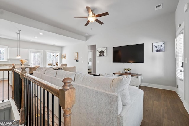 living area with a ceiling fan, visible vents, dark wood-style floors, baseboards, and recessed lighting