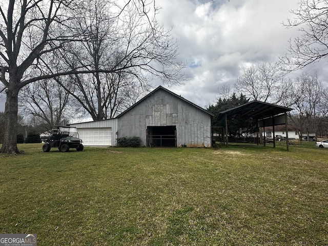 view of pole building with a yard