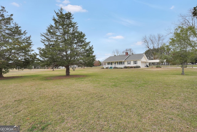 view of yard featuring an attached garage