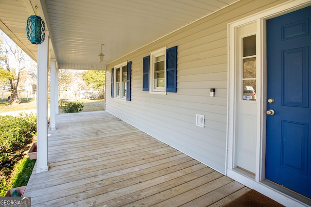 deck with covered porch