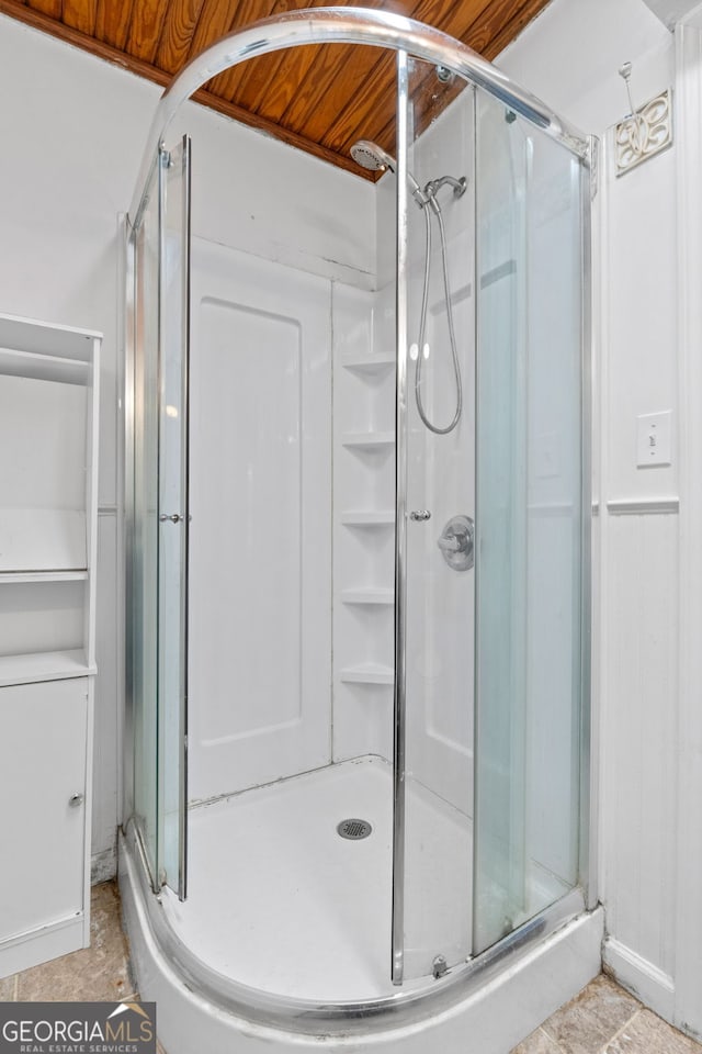 bathroom featuring a stall shower