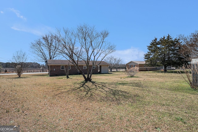 view of yard with fence