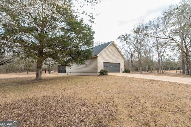 12701 Ga Highway 96 E, Fort Valley, GA 31030 - view of side of home with concrete driveway and an attached garage