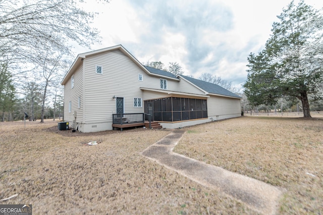 12701 Ga Highway 96 E, Fort Valley, GA 31030 - back of property with a sunroom, crawl space, a yard, and a deck