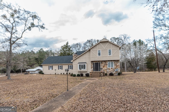 12701 Ga Highway 96 E, Fort Valley, GA 31030 - tudor house with a chimney, stone siding, and stucco siding