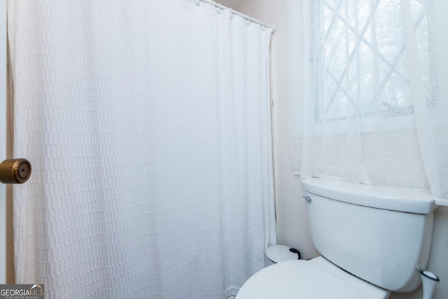12701 Ga Highway 96 E, Fort Valley, GA 31030 - bathroom featuring toilet and curtained shower