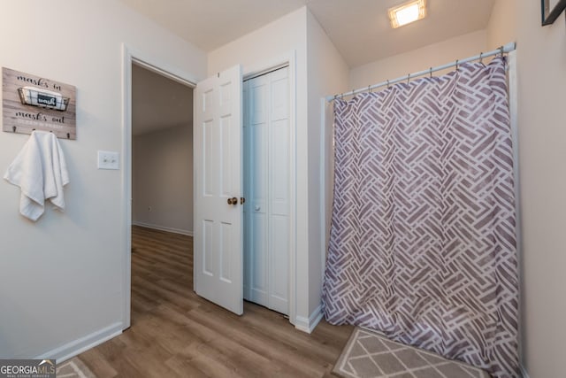 12701 Ga Highway 96 E, Fort Valley, GA 31030 - bathroom with wood finished floors and curtained shower