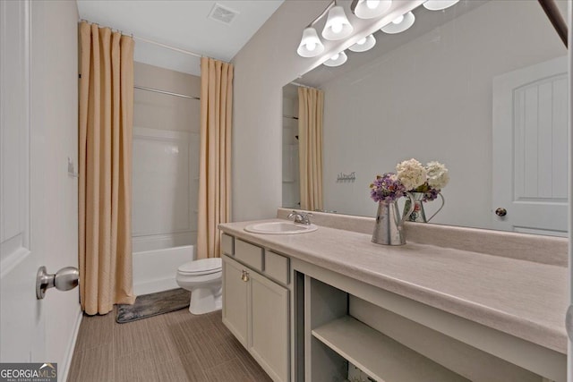 bathroom with shower / bath combo with shower curtain, visible vents, toilet, and vanity