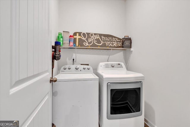 laundry room with washing machine and dryer and laundry area