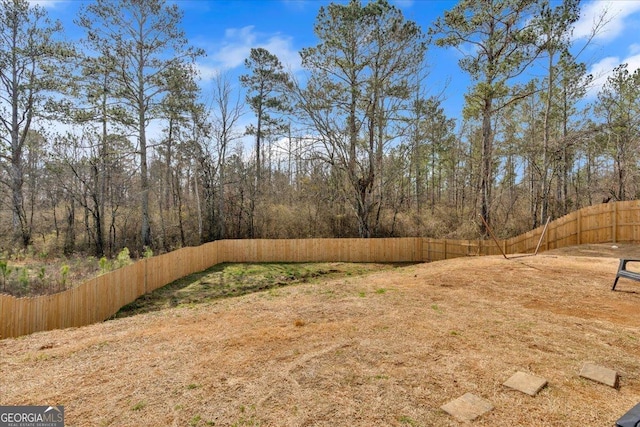 view of yard featuring fence