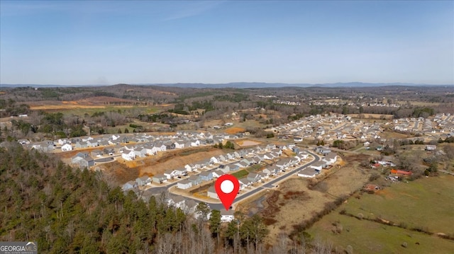 birds eye view of property with a residential view and a mountain view