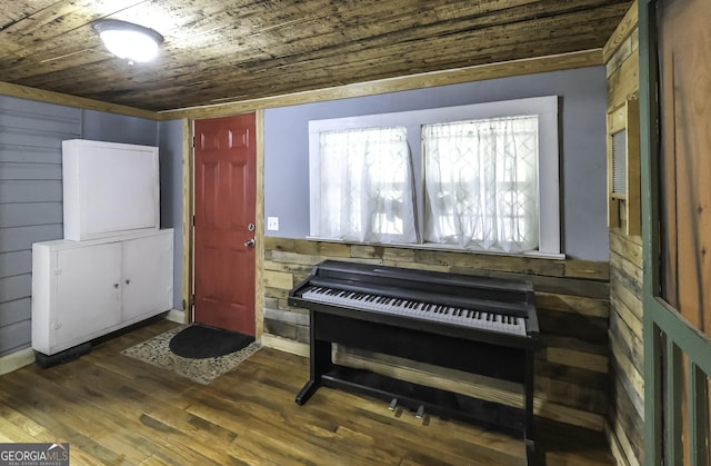 interior space with dark wood-style floors and wood ceiling