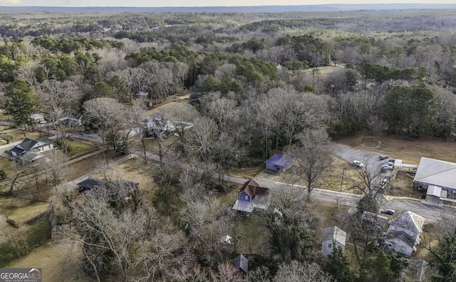 aerial view featuring a view of trees