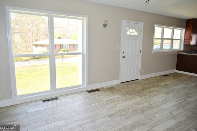 110 Wildwood Cir, Gainesville, GA 30501 - entrance foyer featuring visible vents, baseboards, and light wood-style flooring