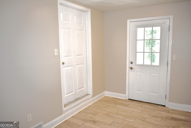 110 Wildwood Cir, Gainesville, GA 30501 - doorway with baseboards and light wood finished floors