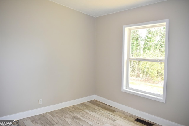 110 Wildwood Cir, Gainesville, GA 30501 - spare room featuring a wealth of natural light, visible vents, baseboards, and light wood-type flooring