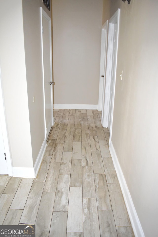110 Wildwood Cir, Gainesville, GA 30501 - hallway featuring baseboards and wood finish floors