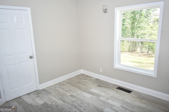 110 Wildwood Cir, Gainesville, GA 30501 - spare room featuring visible vents, baseboards, and wood finished floors