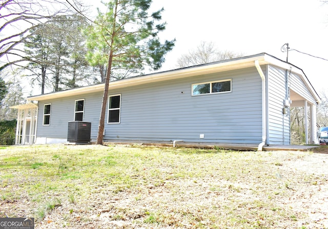110 Wildwood Cir, Gainesville, GA 30501 - back of house featuring cooling unit and a yard