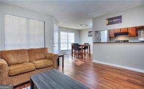 living area with wood finished floors