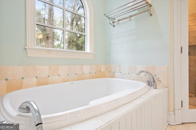 bathroom featuring a garden tub