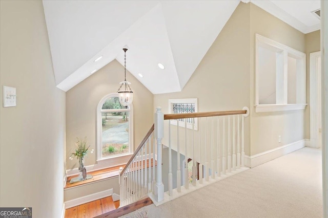 corridor with recessed lighting, an upstairs landing, baseboards, and a chandelier