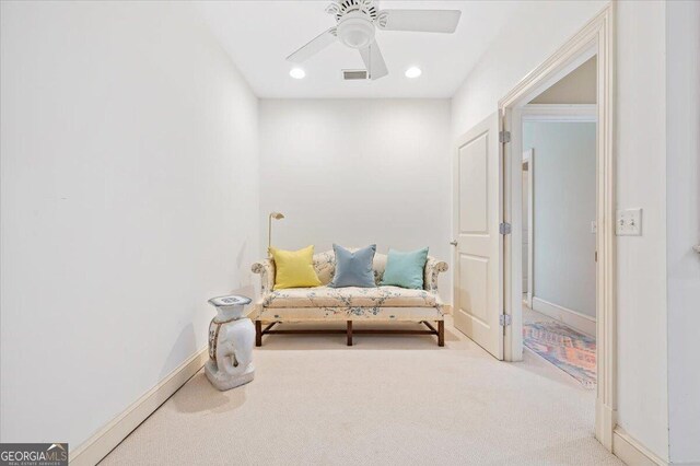 living area with visible vents, baseboards, ceiling fan, carpet floors, and recessed lighting