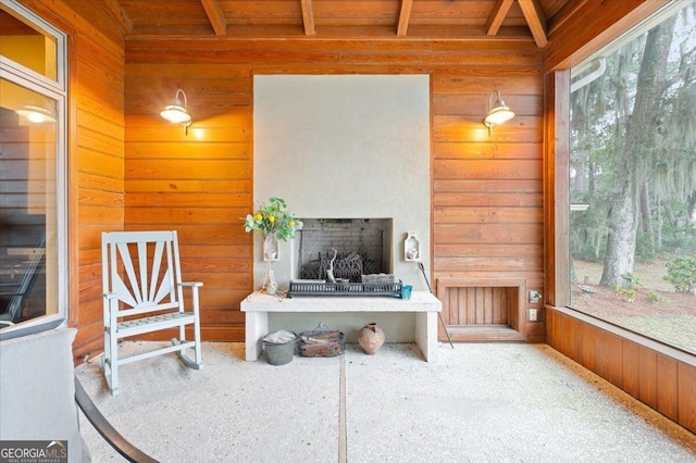 sunroom / solarium with beamed ceiling and wood ceiling