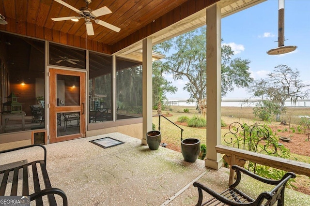 back of house with a lawn, cooling unit, a chimney, a sunroom, and crawl space