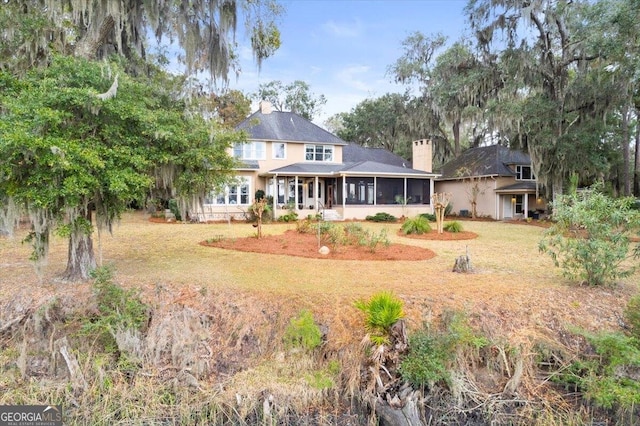 view of front of property featuring stucco siding and concrete driveway