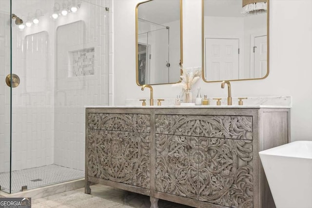 bathroom featuring a sink, double vanity, and tiled shower