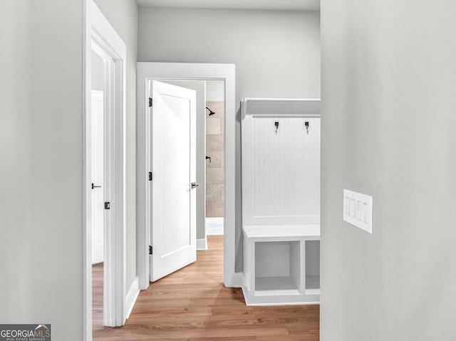 hallway featuring wood finished floors