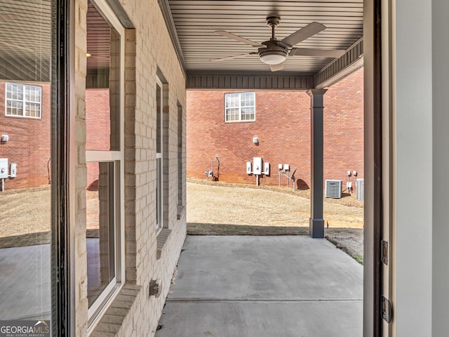 view of patio / terrace with central AC unit and ceiling fan