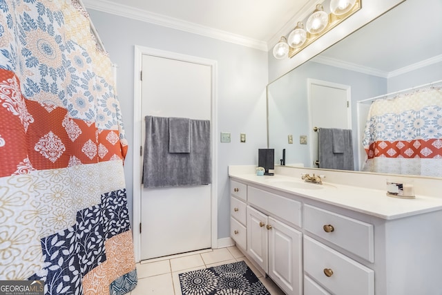 bathroom with tile patterned floors, vanity, and crown molding