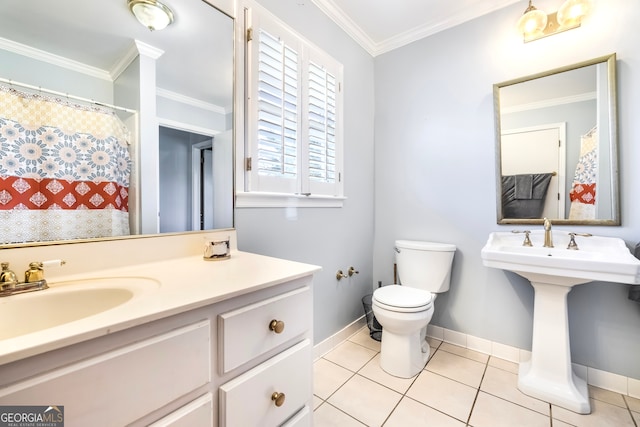 bathroom featuring tile patterned flooring, ornamental molding, toilet, and a sink