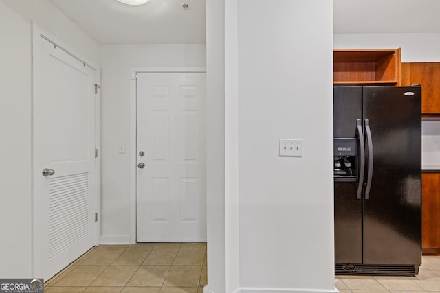 interior space featuring light tile patterned floors