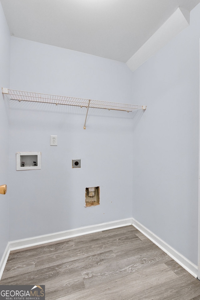 3682 Harvest Dr, Decatur, GA 30034 - laundry area featuring hookup for an electric dryer, wood finished floors, hookup for a washing machine, and baseboards