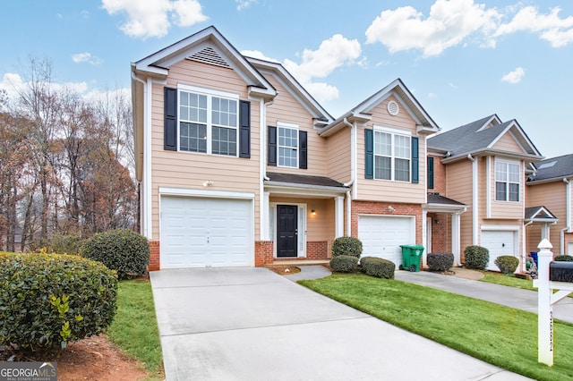 view of front facade featuring brick siding, concrete driveway, and an attached garage