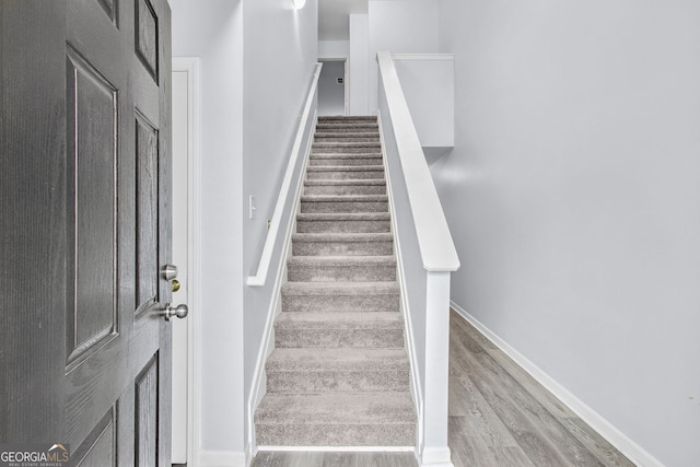3682 Harvest Dr, Decatur, GA 30034 - stairway with wood finished floors and baseboards
