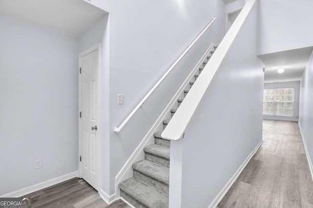3682 Harvest Dr, Decatur, GA 30034 - staircase featuring wood finished floors and baseboards