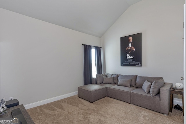 living room with carpet, baseboards, and high vaulted ceiling