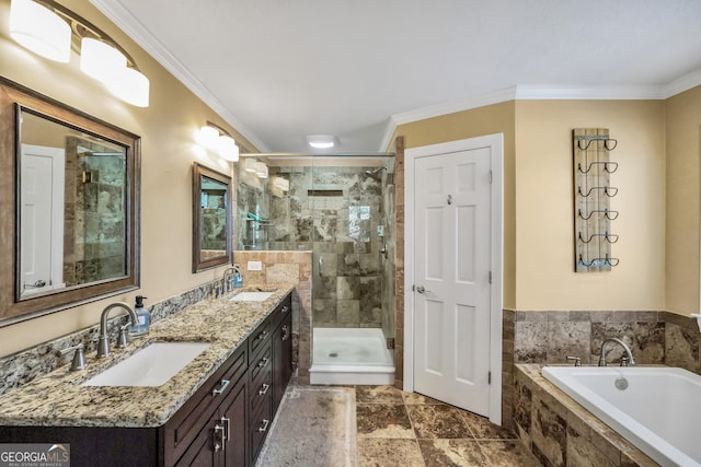 full bath with a shower stall, crown molding, a garden tub, and a sink