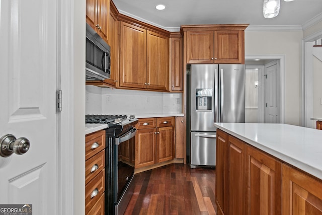 kitchen featuring brown cabinets and stainless steel appliances