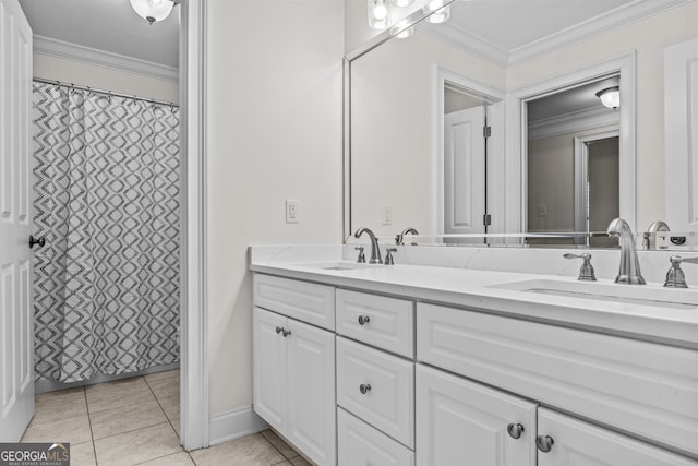 bathroom featuring tile patterned flooring, double vanity, crown molding, and a sink