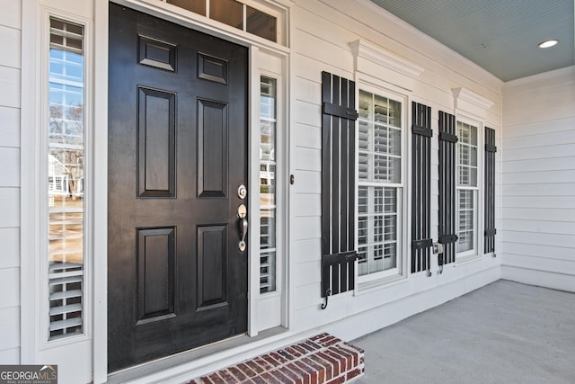 entrance to property with a porch