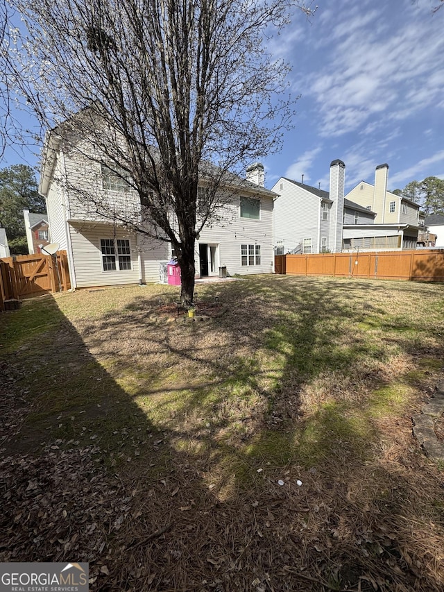 view of yard featuring fence