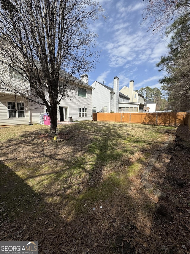 view of yard featuring fence