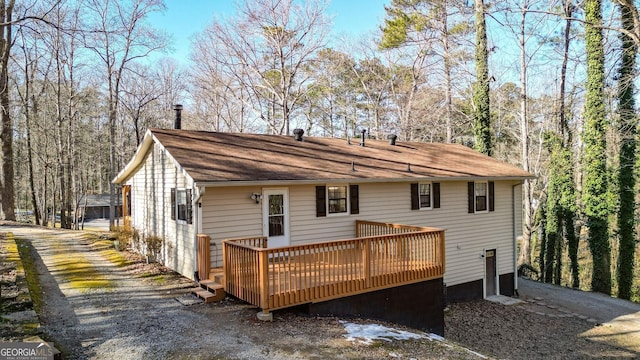 rear view of house with a deck