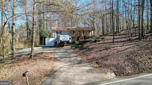 view of front of home featuring concrete driveway