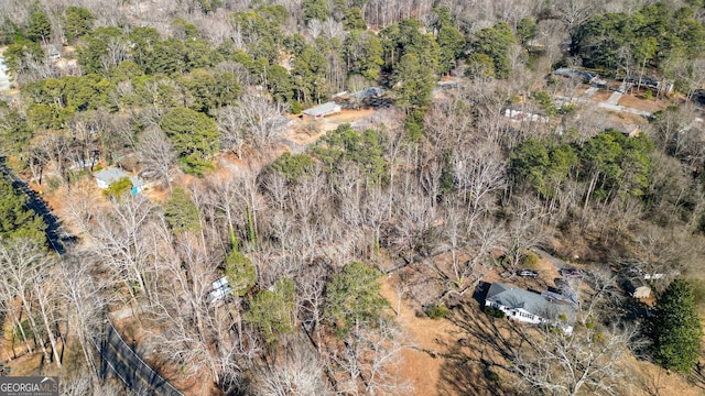 aerial view featuring a forest view